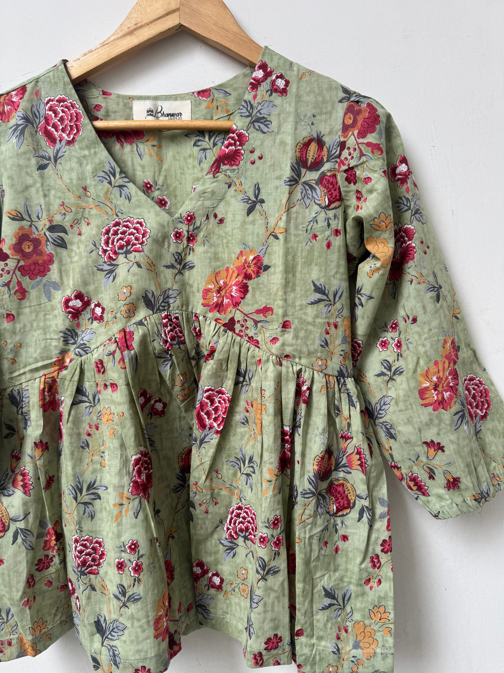 Sage Rosette Top | Premium Women's Peplum Tops